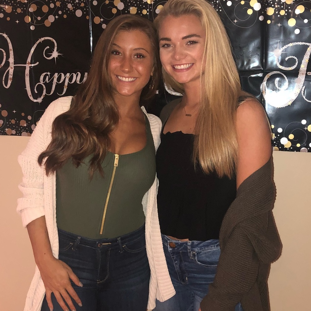 Army Green bodysuit with gold zipper.